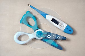 Childrens scissors and thermometer