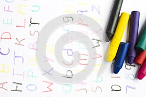 Childrens writing with wax crayons