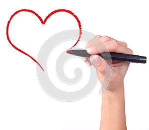 Childs hand drawing heart