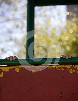 Childs hand at the playground