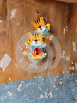 Childs lantern, wall art amid the urban decay, D4 HCMC, Vietnam