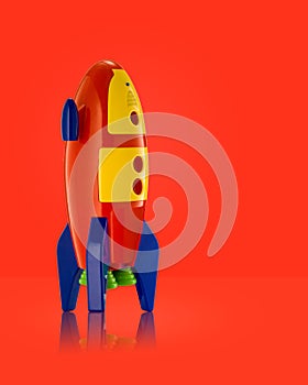 Childs toy rocket on white background