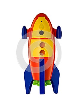 Childs toy rocket on white background photo