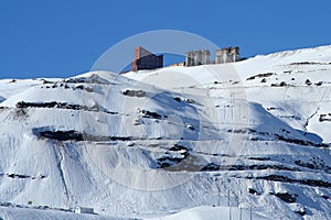 Hotels on snowy mountainside photo