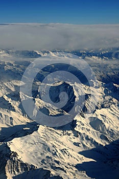 CHILE ARGENTINA Aerial view of the Andes mountain range with highest and snowy peaks such as Aco