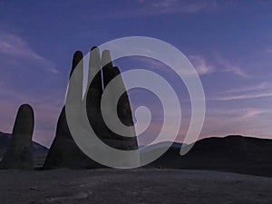 Chile atacama hand statue night