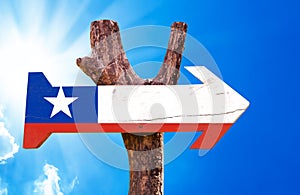 Chile Flag wooden sign with sky background
