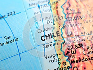 Chile South America focus macro shot on globe map for travel blogs, social media, website banners and backgrounds.