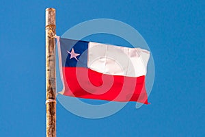 Chilean flag, blue sky background