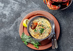 CHILEAN FOOD.  Baked crabmeat crab meat with cheese, cream and bread.  Traditional dish of chilean coast. Pastel o chupe de jaiba