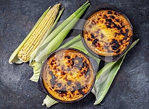 Chilean food. Traditional Pastel de Choclo corn pie. Beef meat with onion, chicken and egg covered with ground corn in