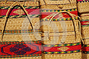 Chilean handcrafted woven straw duffle bags