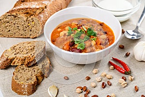 Chili Beans Stew, Bread, Red Chili Pepper And Garlic