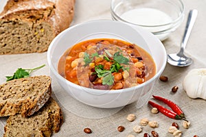 Chili Beans Stew, Bread, Red Chili Pepper And Garlic