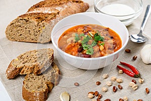 Chili Beans Stew, Bread, Red Chili Pepper And Garlic