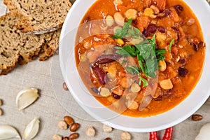 Chili Beans Stew, Bread, Red Chili Pepper And Garlic