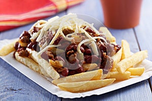 Chili con carne and French fries photo