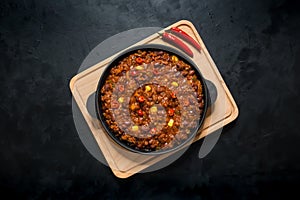 Chili con carne in frying pan. Texas chili.