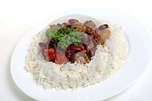 Chili con carne on rice, white background photo