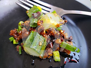 Chili Crisp Cucumber Appetizer Dish at a Japanese Restaurant