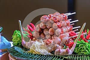 Chili Isaan sausage with vegetable, Thai style sausages and fresh vegetables.