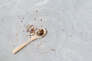 Chili paste mix with peppers on stone background. Peperoncino. This condiment is ingredient of harissa, ajika, muhammara or other