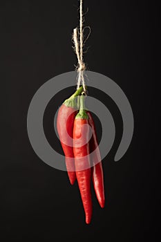 Chili pepper hanging on a rope