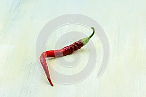 Red hot chili pepper on white background photo
