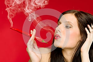 Chili pepper portrait young woman smoke red hot