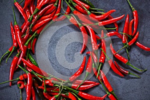 Chili pepper, Red hot chilli peppers on dark background. Close up group of ripe red chilli