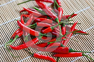 Chili pepper, Red hot chilli peppers on wooden background. Close up group of ripe red chilli