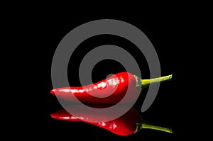 Chili peppers on a dark background