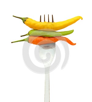 Chili peppers on fork