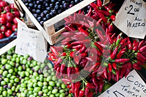 Chili peppers in open air market in Italy