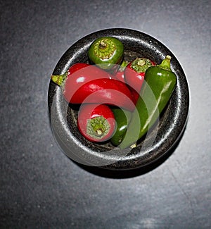Chili Peppers In Stone Mortar & Pestle Up Close Above View