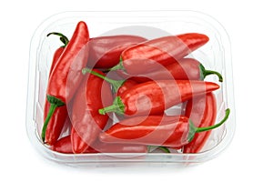 Chili peppers in a transparent plastic box