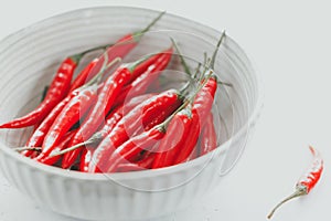 Chili peppers in a white ceramic bowl