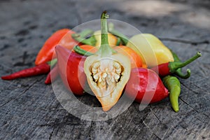 Chili peppers on wooden background