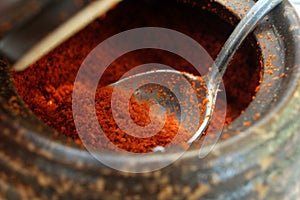 Chili powder in a small earthenware jar