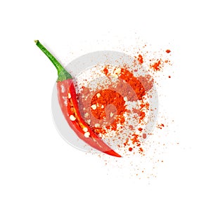 Chili powder spilled out of a cut open chili pepper