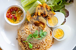 Chili rice in Thai authentic style on white plate