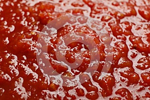 Chili sauce textured background, top view, closeup