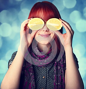 Chill girl in scarf keep lemon instead of eye