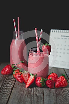 chill and relax time with strawberry smoothie with wood background and copy space