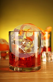 Chilled Alcohol Drink with Ice Cube and Orange Peel