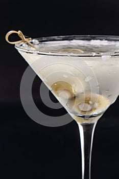 Chilled vodka martini with bleu cheese stuffed olives