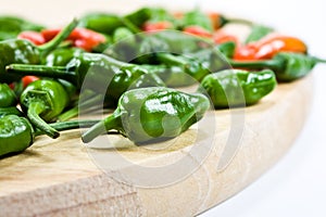 Chillies on chopping board