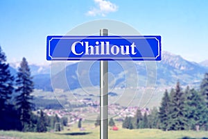 Chillout on blue street sign with landscape