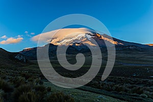Chimborazo with clouds and blue sky