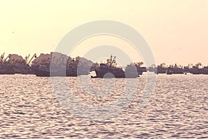 Chimbote, Peru - Trawlers and boats moored at Chimbote, Peru with white mountain in background